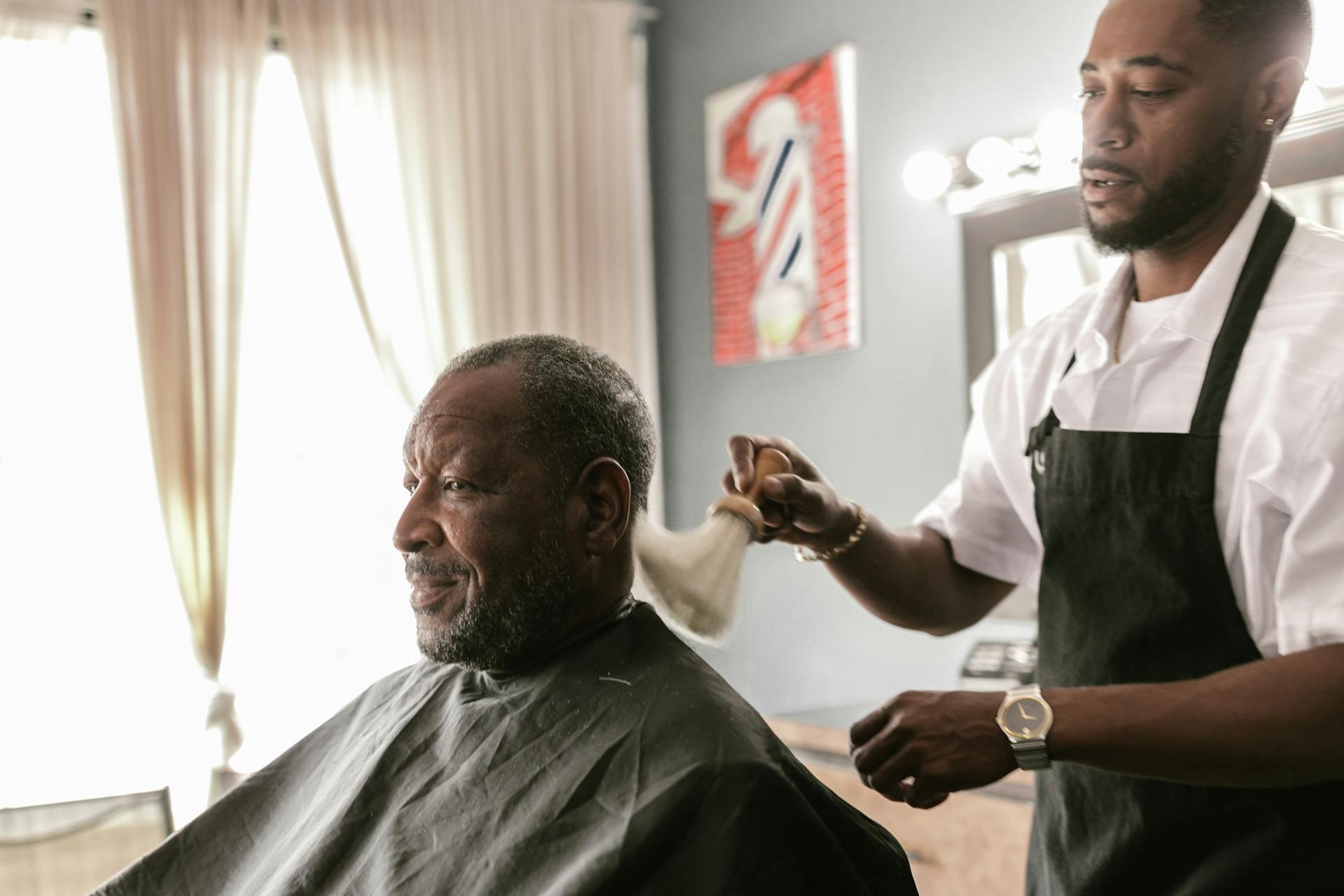 Black-comb haircut session at Kalm Grooming